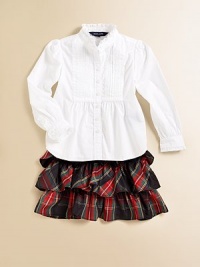 Traditional tartan plaid is crafted into a flirty tiered skirt accented with a flurry of ruffles for a fun, stylish touch.Elastic waistbandTiered ruffle constructionPolyesterDry cleanImported Traditional tartan plaid is crafted into a flirty tiered skirt accented with a flurry of ruffles for a fun, stylish touch.Elastic waistbandTiered ruffle constructionPolyesterDry cleanImported