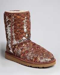 UGG® Australia's chicly sparkling camouflage boots aren't hiding anything-except your toes from wintry elements, of course. UGG® Australia's chicly sparkling camouflage boots aren't hiding anything-except your toes from wintry elements, of course.