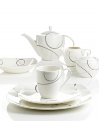 With a free-flowing circle design in shades of gray from Mikasa dinnerware, dishes like this bright white saucer add fun, contemporary appeal to any table. In ultra-durable porcelain. With a free-flowing circle design in shades of gray from Mikasa dinnerware, dishes like this bright white saucer add fun, contemporary appeal to any table. In ultra-durable porcelain.