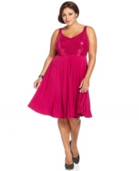 Ring in the holiday season with Spense's A-line plus size dress, finished by a sequined top and pleated skirt. Ring in the holiday season with Spense's A-line plus size dress, finished by a sequined top and pleated skirt.