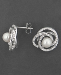 Style that's out of this world. These beautiful earrings feature cultured freshwater pearls (5 mm) and round-cut diamond accents (1/2 ct. t.w.) set in 14k white gold. Style that's out of this world. These beautiful earrings feature cultured freshwater pearls (5 mm) and round-cut diamond accents (1/2 ct. t.w.) set in 14k white gold.