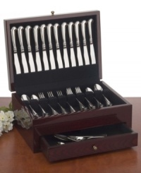 Keep your finest flatware beautifully organized and safe from the elements with this exquisite chest, a vintage 19th century design from the Colonial Williamsburg collection. With a mahogany wood veneer finish on the exterior, the box features tarnish proof lining to help keep silverware shining like new. Holds 150 pieces of flatware. Measures 17 x 12.5 x 6.5. Keep your finest flatware beautifully organized and safe from the elements with this exquisite chest, a vintage 19th century design from the Colonial Williamsburg collection. With a mahogany wood veneer finish on the exterior, the box features tarnish proof lining to help keep silverware shining like new. Holds 150 pieces of flatware. Measures 17 x 12.5 x 6.5.