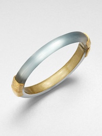 From the Lucite Collection. A sleek bangle of hand-sculpted, hand-painted lucite, accented with crinkle-textured goldtone bands at the hinge and closure.LuciteGoldtoneDiameter, about 2.5Width, about .4Hinged, with magnetic closureMade in USA From the Lucite Collection. A sleek bangle of hand-sculpted, hand-painted lucite, accented with crinkle-textured goldtone bands at the hinge and closure.LuciteGoldtoneDiameter, about 2.5Width, about .4Hinged, with magnetic closureMade in USA