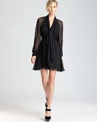 Stylishly spotted, this Rachel Zoe dress boasts plush burnout dots, sheer sleeves and a flowing, feminine silhouette. Stylishly spotted, this Rachel Zoe dress boasts plush burnout dots, sheer sleeves and a flowing, feminine silhouette.