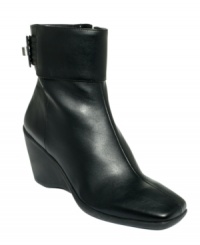 Buckle in for a stylish excursion with the Midge booties from Bandolino. The wedges feature a buckle around the ankle for a fashionable touch. Buckle in for a stylish excursion with the Midge booties from Bandolino. The wedges feature a buckle around the ankle for a fashionable touch.