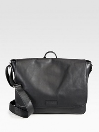 A timeless messenger style, crafted from super soft, drum-dyed leather, exudes skillful craftsmanship and attention to detail. The adjustable shoulder strap allows you to transport your bag with comfort and ease, while interior slip pockets neatly organizes your documents and daily essentials.Magnetic flap closureTop handleAdjustable shoulder strapInterior slip pocketCotton twill/leather liningLeather16W x 13H x 5DImported A timeless messenger style, crafted from super soft, drum-dyed leather, exudes skillful craftsmanship and attention to detail. The adjustable shoulder strap allows you to transport your bag with comfort and ease, while interior slip pockets neatly organizes your documents and daily essentials.Magnetic flap closureTop handleAdjustable shoulder strapInterior slip pocketCotton twill/leather liningLeather16W x 13H x 5DImported