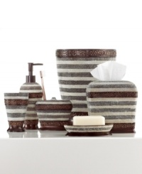 A mix of modern and classic, this Cordonette tumbler features a brushed oil finish with elegant scroll details and sparkling beaded accents for a sophisticated look in the bathroom. A mix of modern and classic, this Cordonette tumbler features a brushed oil finish with elegant scroll details and sparkling beaded accents for a sophisticated look in the bathroom.