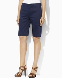 Rendered in sleek stretch twill, Huldah Bermuda shorts are a sophisticated warm weather staple. Rendered in sleek stretch twill, Huldah Bermuda shorts are a sophisticated warm weather staple.