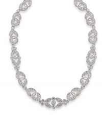 Elevate your look to stunning with this sparkling necklace by Carolee. Features an ornate pattern highlighting dozens of glittering glass stones set in silver tone mixed metal. Approximate length: 16 inches + 2-inch extender. Elevate your look to stunning with this sparkling necklace by Carolee. Features an ornate pattern highlighting dozens of glittering glass stones set in silver tone mixed metal. Approximate length: 16 inches + 2-inch extender.