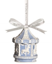 Fill your child's first Christmas with the understated grace of Wedgwood's carousel ornament. Embossed horses and garland in crisp white contrast cool blue porcelain. Dated 2012. Fill your child's first Christmas with the understated grace of Wedgwood's carousel ornament. Embossed horses and garland in crisp white contrast cool blue porcelain. Dated 2012.