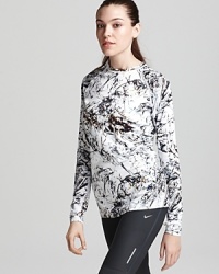 Warm-up routine: Choose this insulating base-layer top from Nike's new Hyperwarm line, featuring Therma-FIT fabric and a sleek, stretchy fit. Warm-up routine: Choose this insulating base-layer top from Nike's new Hyperwarm line, featuring Therma-FIT fabric and a sleek, stretchy fit.