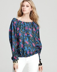 Adorned with a neon animal print, this Rachel Zoe top brightens up streamlined separates like white skinnies and coordinating color jeans. Adorned with a neon animal print, this Rachel Zoe top brightens up streamlined separates like white skinnies and coordinating color jeans.
