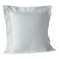 A solid pique throw pillow with a hemstitch border adds classic style. A solid pique throw pillow with a hemstitch border adds classic style.