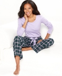 Relax in complete comfort in these pajamas by Nautica. The scoop neck top features an anchor logo on the lower corner of the shirt, while the roomy pants feature contrasting satin lining on the the inside of the elastic waistband. Relax in complete comfort in these pajamas by Nautica. The scoop neck top features an anchor logo on the lower corner of the shirt, while the roomy pants feature contrasting satin lining on the the inside of the elastic waistband.