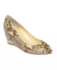 Ivanka Trump's Leelan wedges are a sophisticated staple. Pair them with your workwear or dial down an evening outfit--they're versatile enough to go either way. Ivanka Trump's Leelan wedges are a sophisticated staple. Pair them with your workwear or dial down an evening outfit--they're versatile enough to go either way.