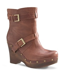 UGG® Australia rides the tough-chic moto trend in these stylish booties with a tender secret: sheepskin linings. UGG® Australia rides the tough-chic moto trend in these stylish booties with a tender secret: sheepskin linings.