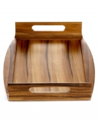 A raised edge and sturdy handles in beautiful acacia give this Lipper International bed tray more stability when it's at your side or on your lap. A must for sick days or a romantic breakfast in bed. A raised edge and sturdy handles in beautiful acacia give this Lipper International bed tray more stability when it's at your side or on your lap. A must for sick days or a romantic breakfast in bed.
