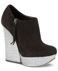Walk proudly in this knock-out style by Boutique 9. The Elister booties feature a thick platform and tall covered heel with gold metal trim. Walk proudly in this knock-out style by Boutique 9. The Elister booties feature a thick platform and tall covered heel with gold metal trim.