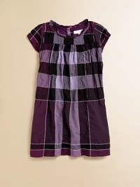 Outstanding checks and a ruffled neckline in a classic straight silhouette on plush cotton voile.Ruffled round necklineShort sleevesBack buttonsA-line skirt97% cotton/2% nylon/1% elastaneMachine washImported Please note: Number of buttons may vary depending on size ordered. Outstanding checks and a ruffled neckline in a classic straight silhouette on plush cotton voile.Ruffled round necklineShort sleevesBack buttonsA-line skirt97% cotton/2% nylon/1% elastaneMachine washImported Please note: Number of buttons may vary depending on size ordered.