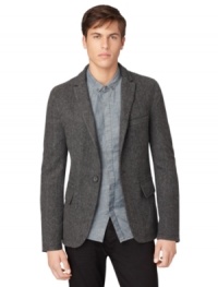 This Calvin Klein Jeans blazer offers a classic look that can be dressed up or down for versatile style. This Calvin Klein Jeans blazer offers a classic look that can be dressed up or down for versatile style.