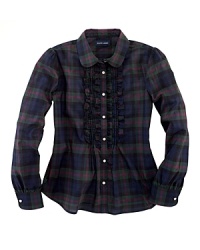 Classic tartan plaid adds heritage flair to a romantic ruffled blouse. Classic tartan plaid adds heritage flair to a romantic ruffled blouse.