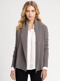 An ultra-cozy knit in luxurious cashmere with an oversized shawl collar. Shawl collarOpen frontRibbed trim at neckline, cuffs and hemAbout 26 longCashmereDry cleanImported