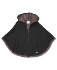 Get in touch with your inner cool boho in this classically styled and always fashionable solid poncho by Roxy with interior native pattern lining. Makes a great gift. Get in touch with your inner cool boho in this classically styled and always fashionable solid poncho by Roxy with interior native pattern lining. Makes a great gift.