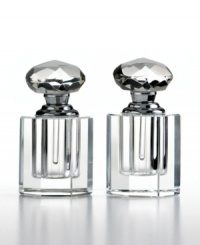 Show some love with perfume bottles from the Heart collection. This meticulously handcrafted pair from Oleg Cassini is topped with heart-shaped stoppers embellished with dazzling faceted cuts. Hallmarked with designer's signature. Show some love with perfume bottles from the Heart collection. This meticulously handcrafted pair from Oleg Cassini is topped with heart-shaped stoppers embellished with dazzling faceted cuts. Hallmarked with designer's signature.