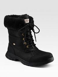 Plush shearling lines the folded-down cuff of a waterproof winter boot, constructed in durable leather with suede detail and rugged rubber trim.Padded insoleRubber soleImportedFur origin: China Plush shearling lines the folded-down cuff of a waterproof winter boot, constructed in durable leather with suede detail and rugged rubber trim.Padded insoleRubber soleImportedFur origin: China