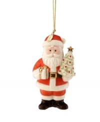 Santa Claus graces your tree with one of his own in this festive annual ornament from Lenox. With gold accents and 2011 charm to mark the season. Santa Claus graces your tree with one of his own in this festive annual ornament from Lenox. With gold accents and 2011 charm to mark the season.