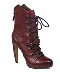 These futuristic booties are worthy of a sci fi superheroine-but work just as well on your Earthly voyages. Dynamic, curved heels and cuffs make a definitive statement; by designer Sam Edelman. These futuristic booties are worthy of a sci fi superheroine-but work just as well on your Earthly voyages. Dynamic, curved heels and cuffs make a definitive statement; by designer Sam Edelman.