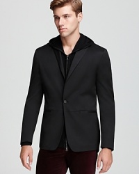 An innovative design from the John Varvatos Collection combines pick stitching accents on a peak lapel blazer silhouette for a fully modernized sport coat with a little flair. An innovative design from the John Varvatos Collection combines pick stitching accents on a peak lapel blazer silhouette for a fully modernized sport coat with a little flair.