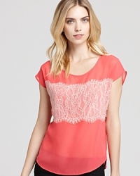 A pretty lace applique at the front of this Aqua top masters coquettish summer style. For a cute pairing, partner the feminine piece with your favorite love-worn jeans. A pretty lace applique at the front of this Aqua top masters coquettish summer style. For a cute pairing, partner the feminine piece with your favorite love-worn jeans.