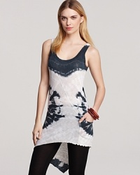 An elongated back hem brings avant-garde drama to this Hard Tail tank, boasting an inky tie-dye print. An elongated back hem brings avant-garde drama to this Hard Tail tank, boasting an inky tie-dye print.