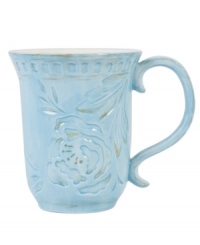 Sculpted blooms and a classic silhouette make the Toulouse mug by Fitz and Floyd a charming part of any casual landscape. A rustic sky-blue glaze adds to its antique appeal. Sculpted blooms and a classic silhouette make the Toulouse mug by Fitz and Floyd a charming part of any casual landscape. A rustic sky-blue glaze adds to its antique appeal.