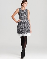 The look of the lady, a fit-and-flare DKNY dress embraces a classic vision of femininity as delicate pleats inspire an intricate lace print. Polish off the look with pearls and delight in the romance of it all. The look of the lady, a fit-and-flare DKNY dress embraces a classic vision of femininity as delicate pleats inspire an intricate lace print. Polish off the look with pearls and delight in the romance of it all.