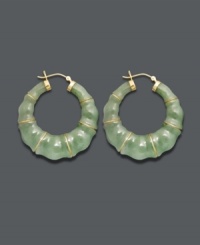 Good luck and great style combine in these unique hoop earrings. Crafted from solid jade (68 mm), earrings feature a bamboo-style pattern with 14k gold accents and backing. Approximate diameter: 1-1/2 inches. Good luck and great style combine in these unique hoop earrings. Crafted from solid jade (68 mm), earrings feature a bamboo-style pattern with 14k gold accents and backing. Approximate diameter: 1-1/2 inches.