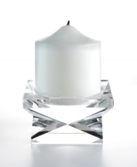 Give decor a distinctly modern edge with the Lexington pillar candle holder. Heavy crystal cut in a bold geometric shape brings acclaimed designer Oleg Cassini's keen sense of style right into your living room. Give decor a distinctly modern edge with the Lexington pillar candle holder. Heavy crystal cut in a bold geometric shape brings acclaimed designer Oleg Cassini's keen sense of style right into your living room.