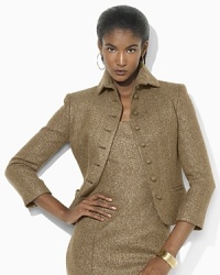Military and heritage inspiration combine in a chic wool jacket, crafted in metallic herringbone. Military and heritage inspiration combine in a chic wool jacket, crafted in metallic herringbone.