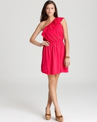 A ruffled neckline lends charming femininity to this richly hued Michael Stars one-shoulder dress. A ruffled neckline lends charming femininity to this richly hued Michael Stars one-shoulder dress.
