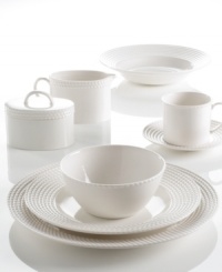 Dine with Wickford dinnerware and tie in timeless sophistication with every meal. This versatile white porcelain party plate has a contemporary shape embossed with a twisting rope design.