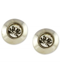 Subtle sparkle is all you need. Vince Camuto's stud earrings feature a sleek design with small crystal accents at the center. Crafted in silver tone mixed metal. Approximate diameter: 1/2 inch. Subtle sparkle is all you need. Vince Camuto's stud earrings feature a sleek design with small crystal accents at the center. Crafted in silver tone mixed metal. Approximate diameter: 1/2 inch.