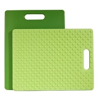 This cutting board will come in handy when it's time to chop vegetables, mince herbs or slice meats. Made of high-density plastic, this cutting board won't absorb odors like wood. The bottom surface is covered in raised rubber grippers that help the board remain stationary as you work. This cutting board will come in handy when it's time to chop vegetables, mince herbs or slice meats. Made of high-density plastic, this cutting board won't absorb odors like wood. The bottom surface is covered in raised rubber grippers that help the board remain stationary as you work.