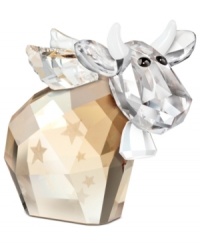 A special Christmas edition of Swarovski's much-loved cow, the 2012 Angel Mo figurine features laser-engraved stars, dazzling wings and a platinum-white bell and horns in exquisitely crafted crystal. A special Christmas edition of Swarovski's much-loved cow, the 2012 Angel Mo figurine features laser-engraved stars, dazzling wings and a platinum-white bell and horns in exquisitely crafted crystal.