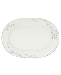 Birch branches grow around this pure white porcelain oval platter, turning formal tables into serene landscapes. A contemporary design refined in polished platinum with a breezy, all-natural beauty. From Noritake's collection of serveware and serving dishes. Birch branches grow around this pure white porcelain oval platter, turning formal tables into serene landscapes. A contemporary design refined in polished platinum with a breezy, all-natural beauty. From Noritake's collection of serveware and serving dishes.