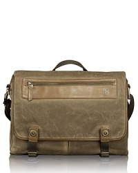 The Forge collection is rendered in wax-coated cotton canvas with leather trim accents and antiqued brass hardware for rugged appeal and utilitarian functionality. With vintage inspiration and artisan detailing, each bag is made to last and performs well in numerous environments. In an authentic messenger silhouette, the Fairview bag offers excellent organization pockets that store all your everyday essentials along with your laptop, electronics, papers and files. The Forge collection is rendered in wax-coated cotton canvas with leather trim accents and antiqued brass hardware for rugged appeal and utilitarian functionality. With vintage inspiration and artisan detailing, each bag is made to last and performs well in numerous environments. In an authentic messenger silhouette, the Fairview bag offers excellent organization pockets that store all your everyday essentials along with your laptop, electronics, papers and files.