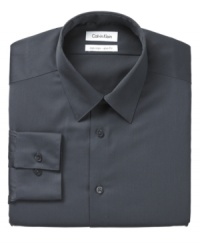 Versatility and dependability. That's what this smart, slim-fitting dress shirt from Calvin Klein offers. Constructed with non-iron fabric and finished with flawless attention to detail, you can't go wrong with this stylish button-down. Versatility and dependability. That's what this smart, slim-fitting dress shirt from Calvin Klein offers. Constructed with non-iron fabric and finished with flawless attention to detail, you can't go wrong with this stylish button-down.