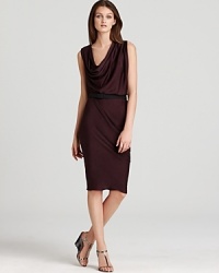 An asymmetrical cowlneck brings bold interest to this supremely sleek Halston Heritage dress, finished with a belt for waist-defining polish. An asymmetrical cowlneck brings bold interest to this supremely sleek Halston Heritage dress, finished with a belt for waist-defining polish.