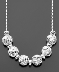 Exquisite waves light up these gorgeous beads (1/2 inch) of diamond-cut sterling silver. Necklace by Giani Bernini. Approximate length: 16 inches. Approximate drop: 2-1/2 inches. Exquisite waves light up these gorgeous beads (1/2 inch) of diamond-cut sterling silver. Necklace by Giani Bernini. Approximate length: 16 inches. Approximate drop: 2-1/2 inches.