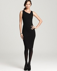 Craft a striking silhouette in a body-con Eileen Fisher dress finished with an asymmetrical neckline for modern feminine allure. Craft a striking silhouette in a body-con Eileen Fisher dress finished with an asymmetrical neckline for modern feminine allure.
